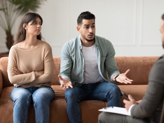 couple-talking-at-therapy-session-with-male-therapist.jpg